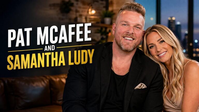Pat McAfee and Samantha Ludy smiling together in a warm indoor setting